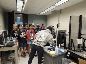 Campers witness on computer screen microscopic images of Oobleck chemical properties.